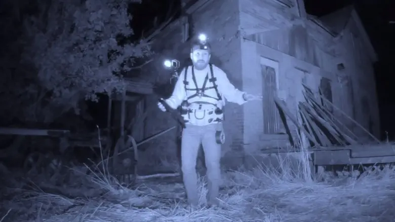 Shawn Ruddy prepares to livestream outside Death Manor in Deadstream 2022