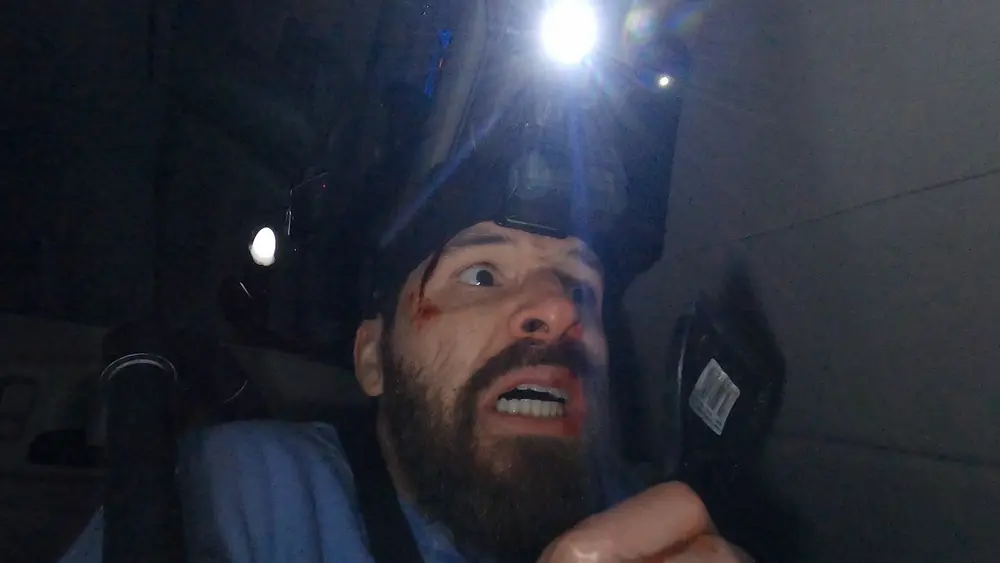 A bloodied Shawn fights to survive the supernatural attacks in Deadstream 2022