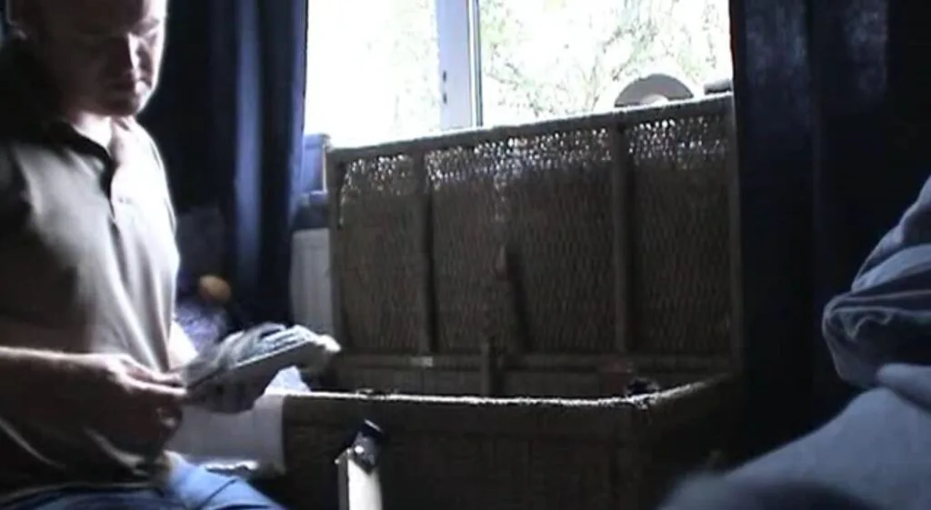 Andy searches through his family’s private belongings in Exhibit A 2007