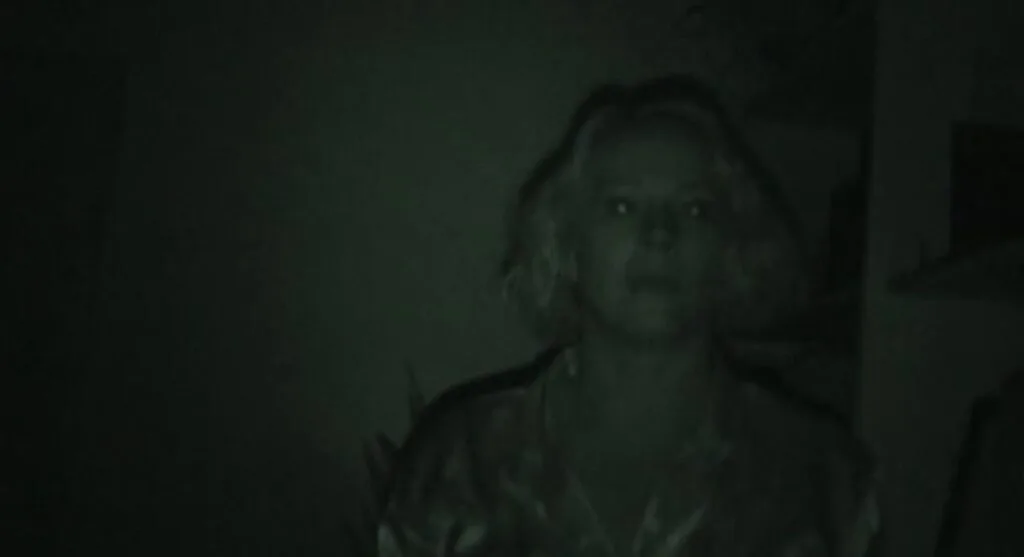 Sheila is captured through night vision during the family confrontation in Exhibit A 2007