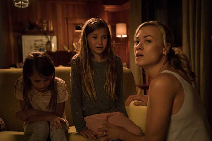 Laura protecting Kayla and Maddie inside the lake house