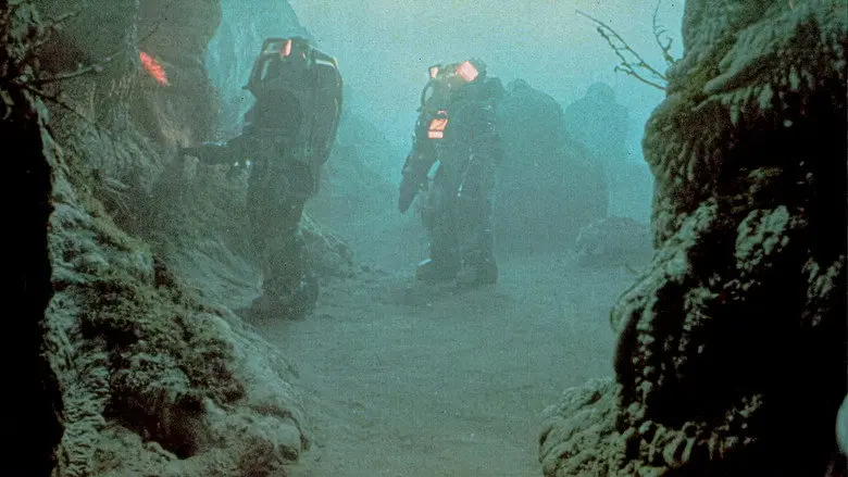 Tri-Oceanic miners cross the ocean floor in deep-sea suits in Leviathan 1989