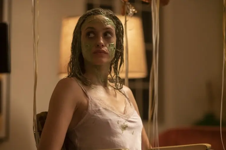 Danielle covered in a green beauty mask while held captive in New Year New You 2018