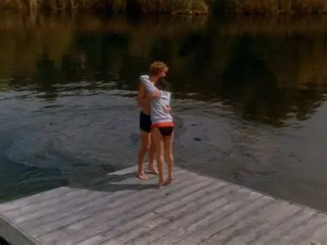 Randy and Laverne huddled together on the raft
