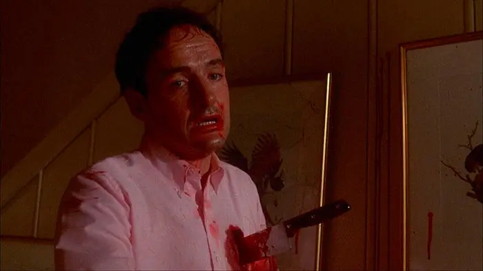 Jerry Blake after being stabbed during the final confrontation in The Stepfather 1987