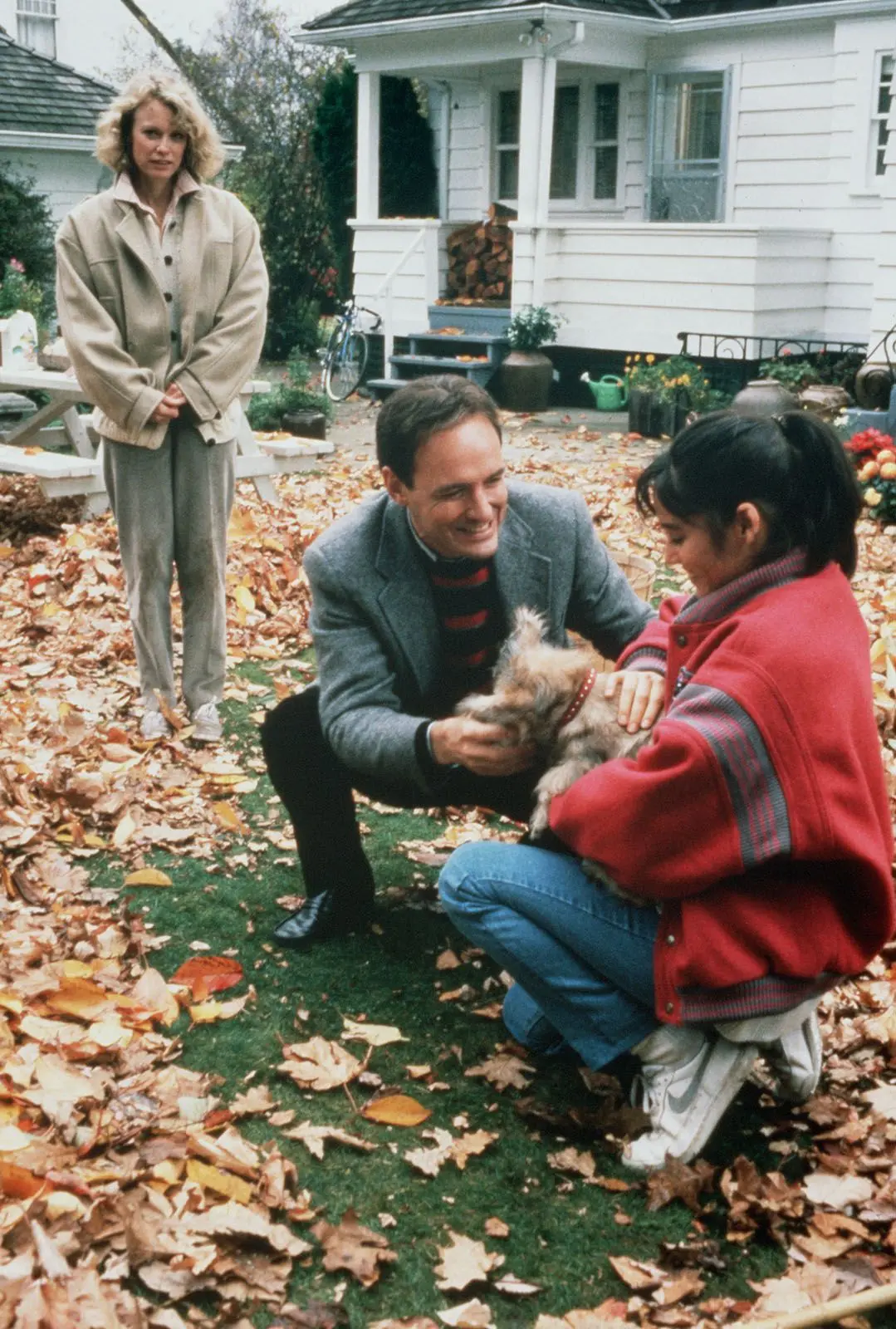 Jerry gives Stephanie a puppy while Susan watches in The Stepfather 1987