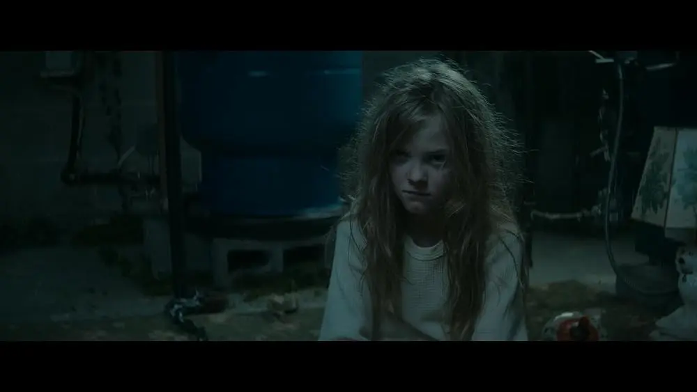 Sweetiepie sitting in the dark basement in Villains